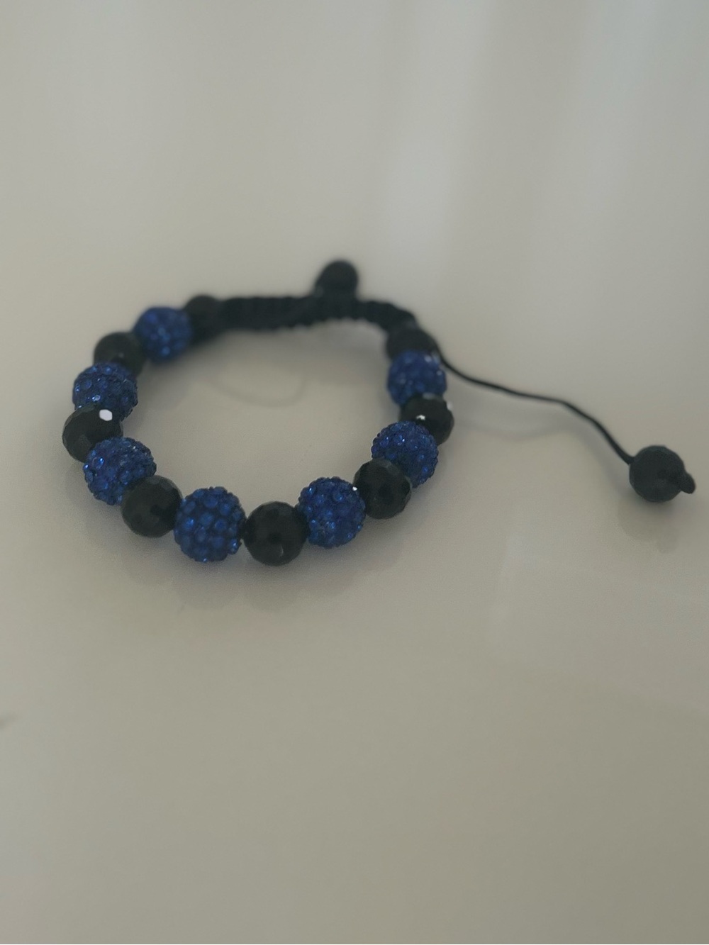 Adjustable Blue and Black Beaded Bracelet
